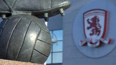 Middlesbrough club logo and statue outside ground