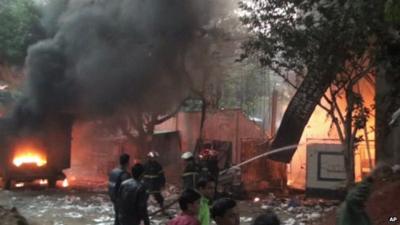 Fire fighters at scene of blazing plastics factory in the Bangladeshi capital, Dhaka