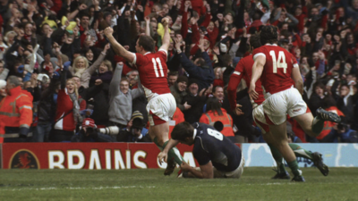 Wales wing Shane Williams celebrates scoring a try against Scotland in their 2010 Six Nations clash in Cardiff.