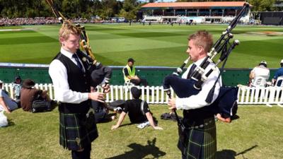 Two bagpipe players at the New Zealand v Scotland match