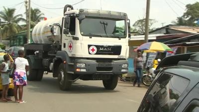 Practice run of a Red Cross truck which will be carrying Ebola-infected human waste