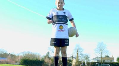 Ben playing rugby