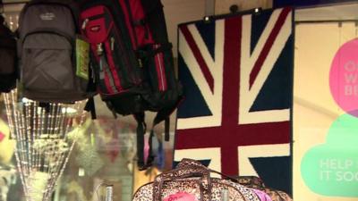 Union flag amongst market stall items