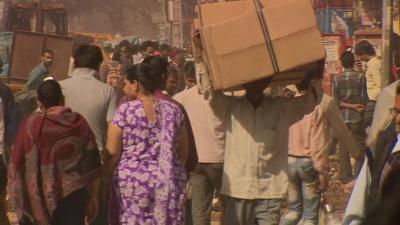 A busy market road in India