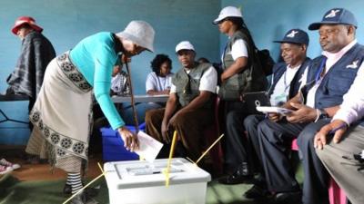 Woman casts ballot in Lesotho