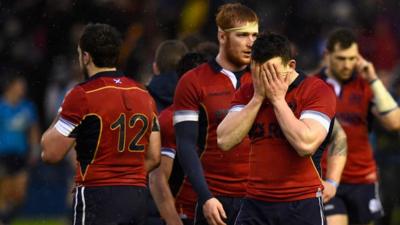 Scotland players react after their defeat to Italy at the Six Nations