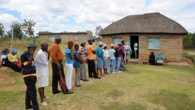 Voters queue to cast their ballots in Lesotho