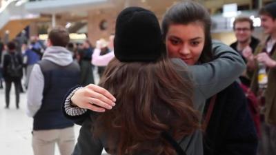 Frozen passengers at train station