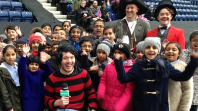 Martin Dougan with children on World Book Day