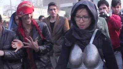 Kubra Khademi on the street in the costume