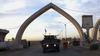 Iraqi security forces patrol in Tikrit, 80 miles north of Baghdad