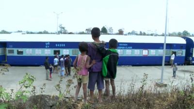 Local children watch new train