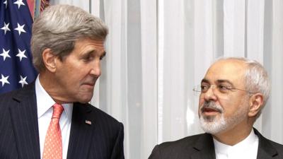 US Secretary of State John Kerry (L) and his Iranian counterpart Mohammad Javad Zarif pose before resuming talks over Iran's nuclear programme in Lausanne