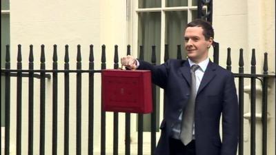 The Chancellor, George Osborne with the iconic red briefcase