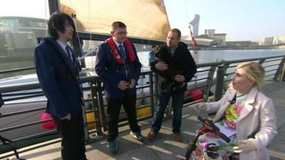 Daniel, Callum, Rory the dog and deputy headteacher Greg Chiswell from the Observatory School in Bidston, Merseyside with the BBC's Disability Correspondent Nikki Fox.