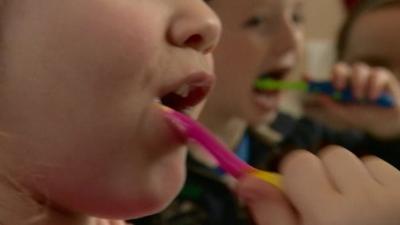 Children brushing their teeth