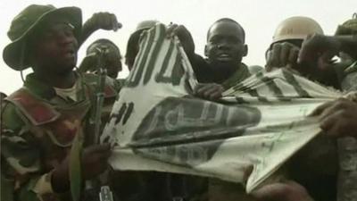 Troops with Boko Haram flag