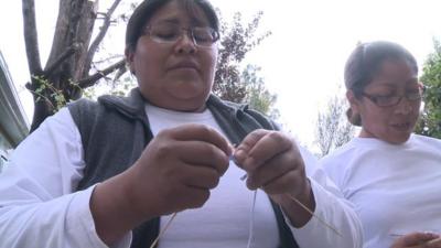 Bolivian women knitting