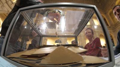 Close up of ballot box as a voter in Marseilles casts his ballot in the second round of French elections