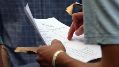 Student receiving exam results