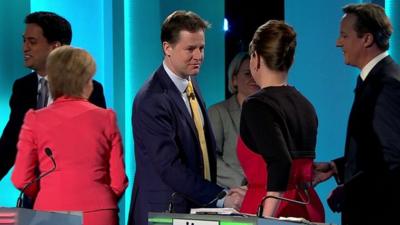 Leaders shake hands at the end of the TV debate