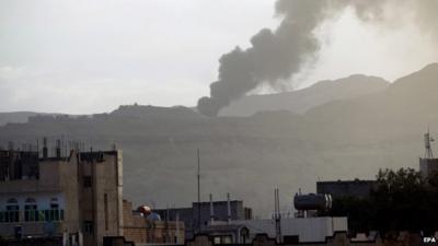 A black pall of smoke rises from an alleged weapons storage depot at a military camp of Houthi rebels following an airstrike of the Saudi-led alliance