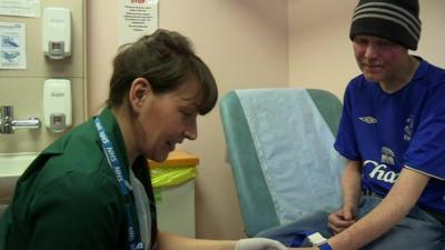 nurse with patient at detox centre