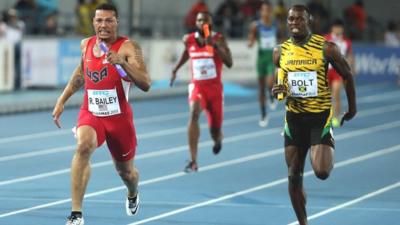 Ryan Bailey leads home Usain Bolt at the World Relay Championships