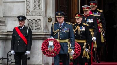 Armed forces lay wreaths at the Cenotaph