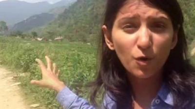 Yogita Limaye pointing at mountains