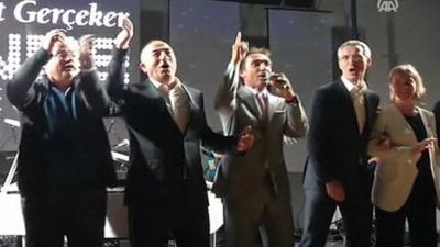 Officials joining in song include from left; Greek FM Nikos Kotzias, Turkish FM Mevlut Cavusoglu, Nato Secretary-General Jens Stoltenberg and EU Foreign Policy Chief Federica Mogherini