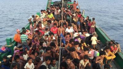 Boat crammed with migrants