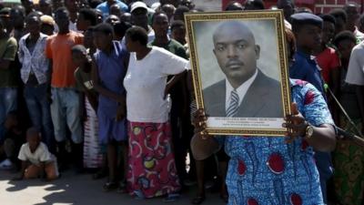 Supporters with portrait of President Nkurunziza