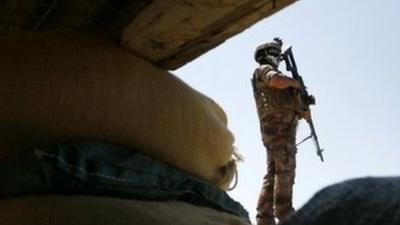 An Iraqi government forces member keeps position