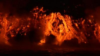 Wolf volcano lava flow reaches the sea
