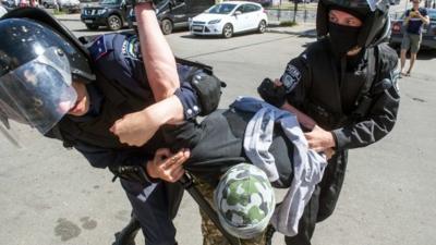 Police make an arrest in Kiev, 6 June 2015