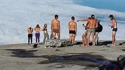 Photo of tourists on mountain