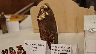 A close up picture of different nativity scenes from around the world. They are a variety of sizes and made out of different materials.