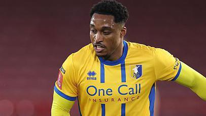 Victor Adeboyejo in action for Mansfield Town.
