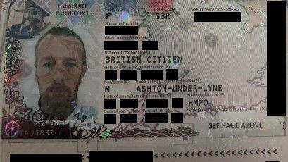 A close-up image of the ID page of a British passport.