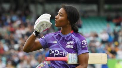 Northern Superchargers batter Davina Perrin blows a kiss as she walks off after hitting a century