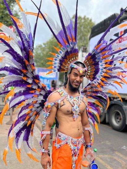 Another shows off his striking feathers