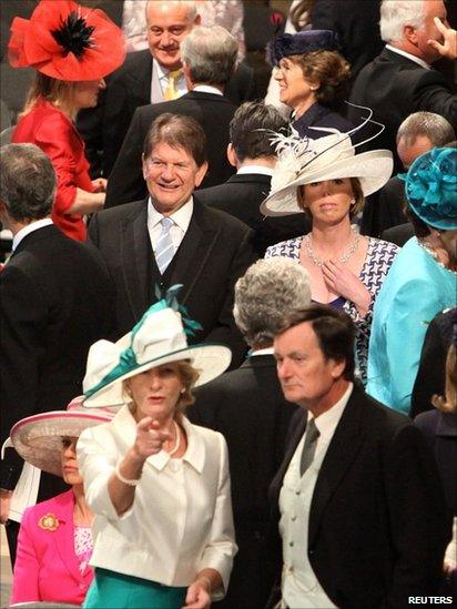 Members of the general congregation arrive at Westminster Abbey