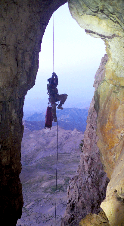 Abseiling to the cave