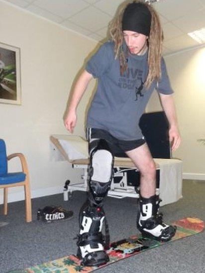 Andy Macleod testing snowboard