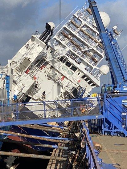 The RV Petrel toppled in Leith Docks