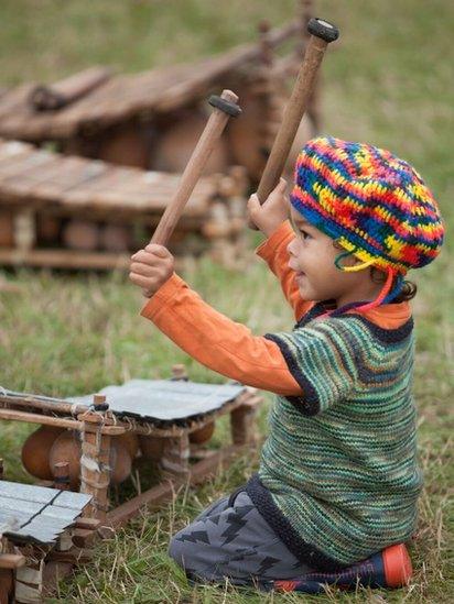 Ziggy P plays xylophone at Womad's World of Kids.