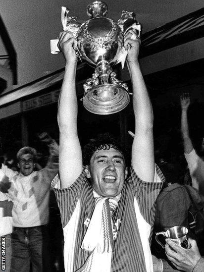 Cardiff City captain Terry Boyle lifts the Welsh Cup aloft following the win over Wrexham in 1988