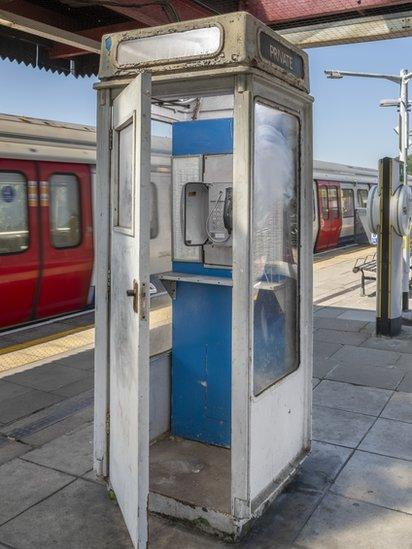 A white one can be found at Northwick station in Harrow on the Metropolitan Line