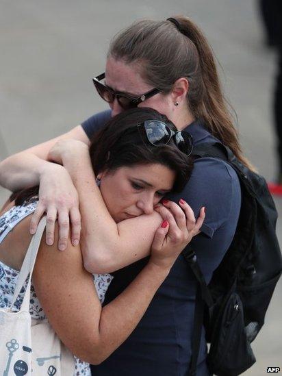 Women hugging